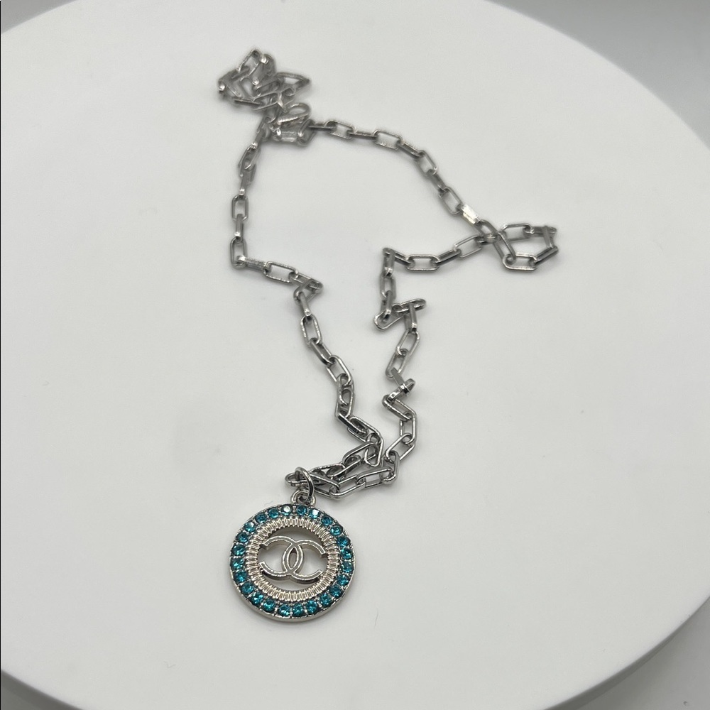 029. Elegant Silver and Blue Crystal Charm Necklace